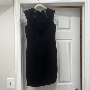 Black knee length sheath/detail at neck- fully lined poly/rayon/spandex